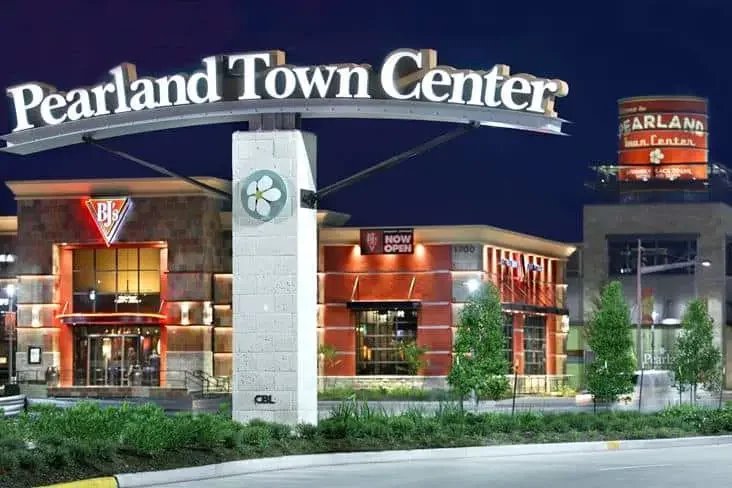 Night view of Pearland Town Center, part of Texas Shield Pest Control’s service area.