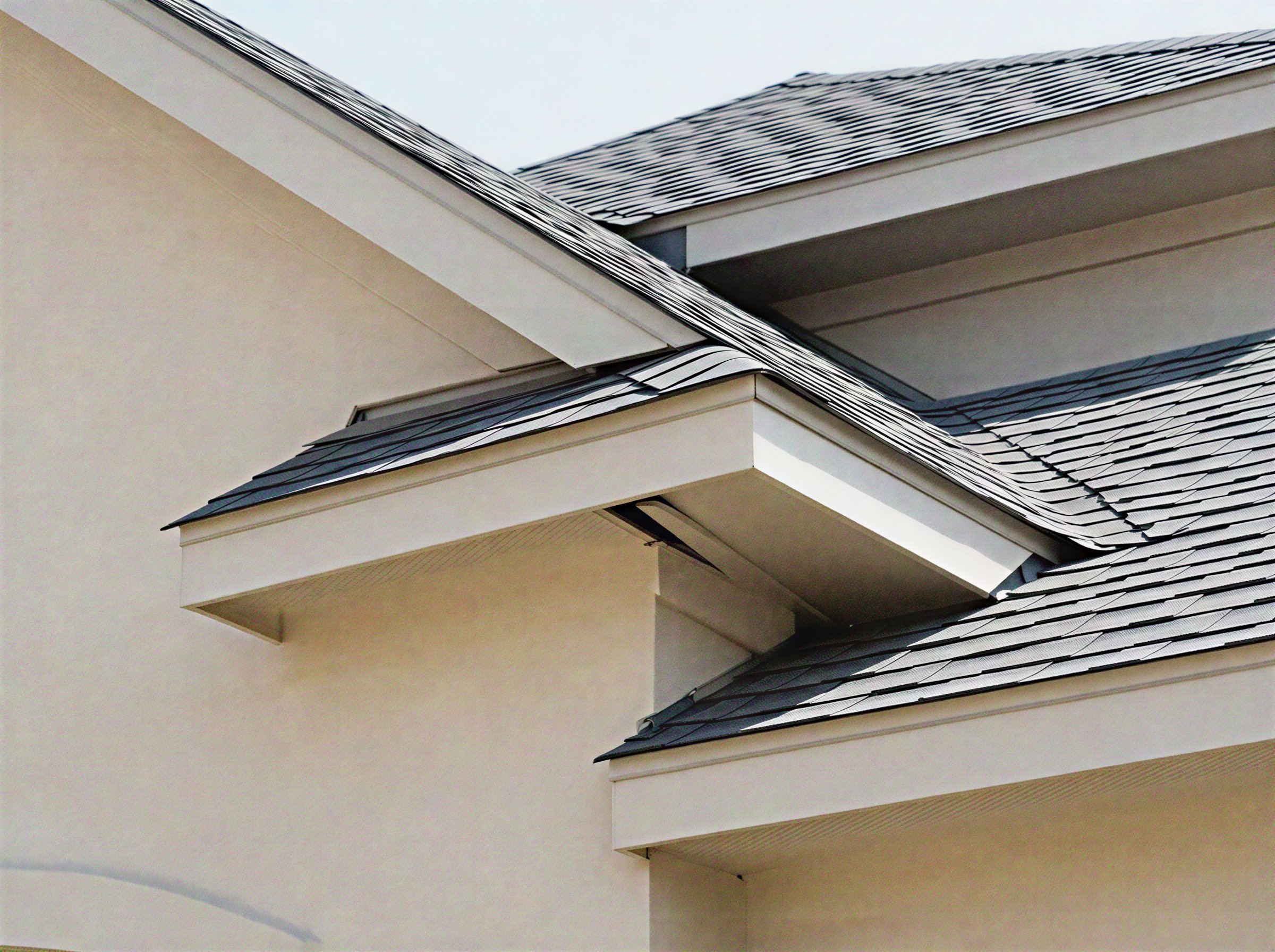 Exterior corner of a Texas home showing siding and roofline.